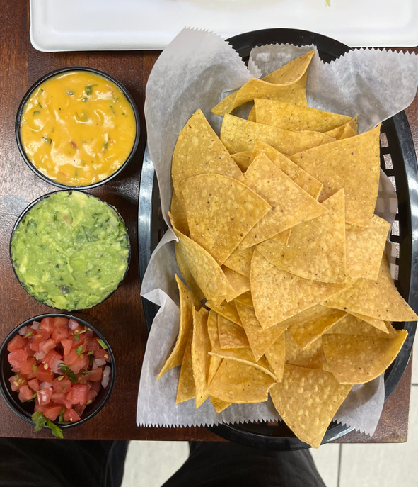 Chips with queso, guacamole and pico de gallo